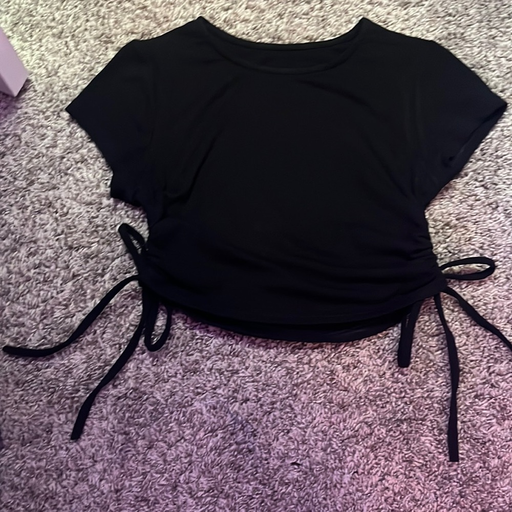 black crop top. can untie at the bottem.